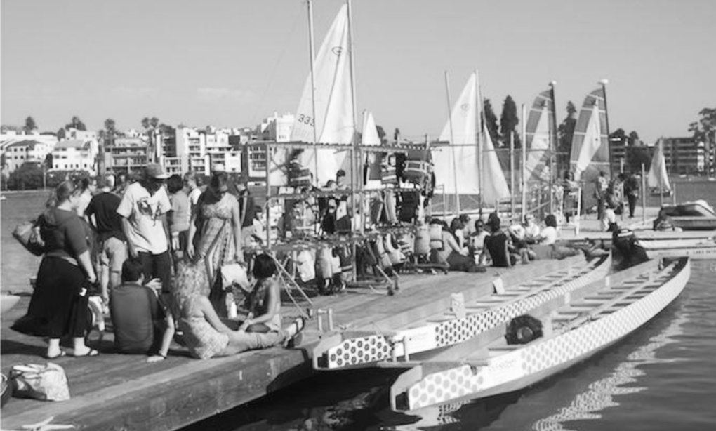 people on the docks of lake merrit